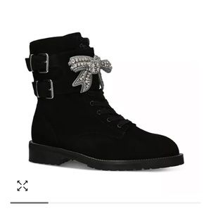 Kurt Geiger embellished bow boots.